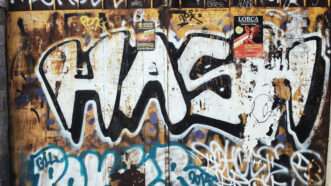 Wall of gritty graffiti. | Andrei Iancu | Dreamstime.com