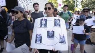 Female protester holds sign protesting abortion ruling | Bob Daemmrich/ZUMAPRESS/Newscom