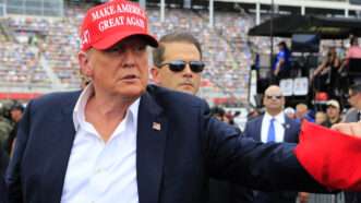 Donald Trump at a NASCAR event | Jeff Robinson/Icon Sportswire AAV/Newscom