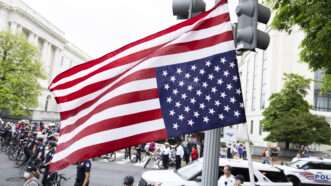 Upside down American flag at a protest | Tom Williams/CQ Roll Call/Newscom