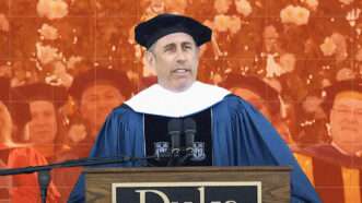 Jerry Seinfeld is seen giving the commencement address at Duke University on May 12 | Screenshot, YouTube