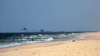 Cargo ship delivering international aid to Gaza via U.S. built pier | Stranger/ZUMAPRESS/Newscom