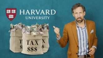 Andrew Heaton points to bags of tax money and the Harvard University logo | Reason TV