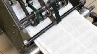 Print machine running copies of newspapers. | Andrey Burmakin | Dreamstime.com