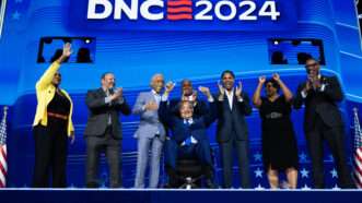 People stand on stage at the 2024 Democratic National Convention in Chicago, Illinois. | Tom Williams/CQ Roll Call/Newscom