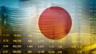 Japanese flag blended with stock returns | sweettomato/Newscom