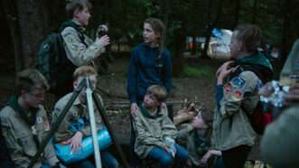 A group of children gathered in the woods | Photo: Dmitry Kostyukov