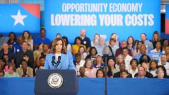 Vice President Kamala Harris speaks at a campaign event in Raleigh, North Carolina, in front of a blue banner that says "OPPORTUNITY ECONOMY, LOWERING YOUR COSTS"q | Josh Brown/ZUMAPRESS/Newscom