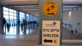 A sign with the inscription "Shelter" indicates a shelter at Ben Gurion Airport near Tel Aviv, Israel. | Karl-Josef Hildenbrand/dpa/picture-alliance/Newscom