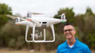 A drone flying next to its pilot | Institute for Justice