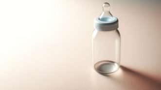 A baby bottle | ID 319835922 © Mykola Ieromenko | Dreamstime.com