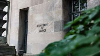 Photo of Department of Justice building. | Valerie Plesch/dpa/picture-alliance/Newscom