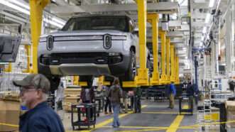 An assembly line of Rivian R1T pickup trucks, at its factory in Normal, Illinois. | Brian Cassella/TNS/Newscom