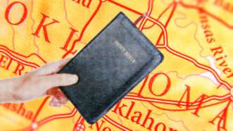 A red and yellow map of Oklahoma with someone holding a Bible in front of it | Illustration: Lex Villena; Marko Bukorovic, Manaemedia | Dreamstime.com