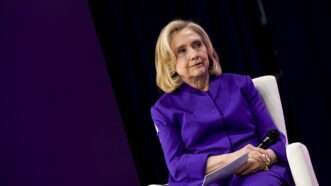 Hillary Clinton on stage during an event | 	Jennifer Graylock-Graylock / Avalon/Newscom