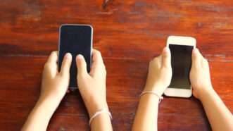 Young people hand using smart phones | Under this restrictive measure, there will be no exceptions, even for parental consent. 