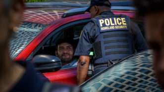 Motorist stopped by Homeland Security officer outside New York Immigration Court at 26 Federal Plaza in New York. | Erik Mcgregor/ZUMA Press/Newscom