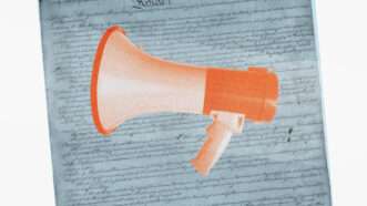 Megaphone in front of an image of the US Constitution | Iodrakon | Dreamstime.com