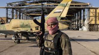 Members of the Islamist Hayat Tahrir al-Sham (HTS) group and allied opposition fighters gained control of Aleppo International Airport in Aleppo, Syria, on December 03, 2024. | Abaca Press/DIA Images/Abaca/Sipa USA/Newscom