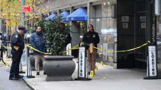 New York Police Department (NYPD) detectives investigate the crime scene around the murder of UnitedHealthcare CEO Brian Thompson. | Kyle Mazza/ZUMAPRESS/Newscom