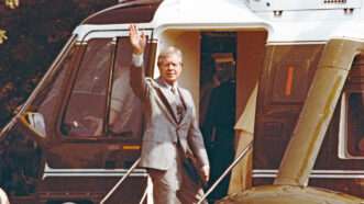 Then-president Jimmy Carter waving before departing on Marine One | CNP/ZUMAPRESS/Newscom