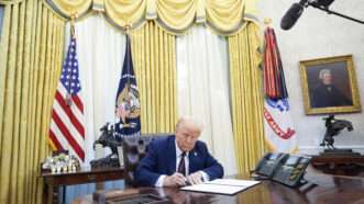 President Donald Trump signing executive orders in the Oval Office | CNP/AdMedia/Sipa/Newscom