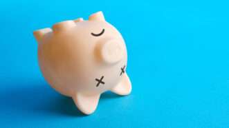 A piggy bank tipped over | Photo: Andrii Yalanskyi/iStock