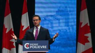 Pierre Poilievre speaks during a debate in May 2022 | Artur Widak/ZUMAPRESS/Newscom