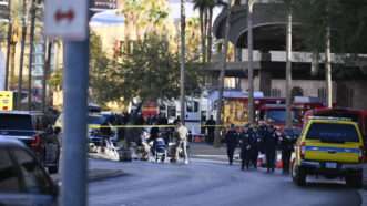 Law enforcement officers work the scene near the entrance of Trump Tower in Las Vegas, Nevada on January 1, 2025. | Mikael Ona/ZUMAPRESS/Newscom