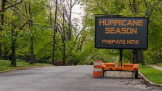 Sign in the forest warning of hurricane season | ID 151422756 © Alan Budman | Dreamstime.com