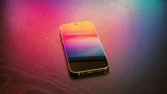 Apple iPhone with a multicolor background | Photo by <a href="https://unsplash.com/@martinsanchez?utm_content=creditCopyText&utm_medium=referral&utm_source=unsplash">Martin Sanchez</a> on <a href="https://unsplash.com/photos/black-samsung-galaxys-4-drS71eDxaDM?utm_content=creditCopyText&utm_medium=referral&utm_source=unsplash">Unsplash</a>       