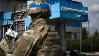 A Ukrainian soldier stands near the Sudzha gas metering station damaged by hostilities, Kursk Oblast, Russia. Aug 17, 2024. | KIRILL CHUBOTIN/SIPA/Newscom