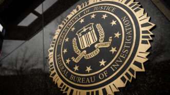 The seal of the Federal Bureau of Investigation (FBI), at an angle. | Samuel Corum/Sipa USA/Newscom