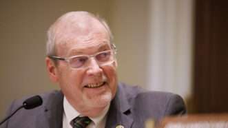 Rep. Morgan Griffith sits indoors with a microphone in front of him, wearing a suit and tie. | Aaron Schwartz/Sipa USA/Newscom