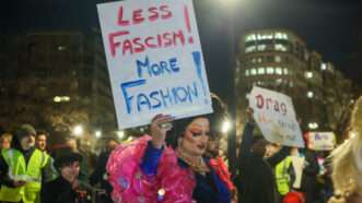 Pro drag show protesters holding signs | Robyn Stevens Brody/Sipa USA/Newscom