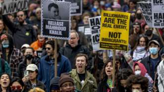 Protesters carry signs in support of releasing Mahmoud Khalil | Michael Nigro/ZUMAPRESS/Newscom