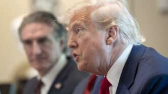 President Trump sits next to Secretary of the Interior Doug Burgum | Sipa USA/Newscom