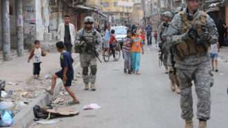 U.S. troops patrol a neighborhood in eastern Baghdad, Iraq, on March 31, 2009. | U.S. Army/Staff Sgt. James Selesnick