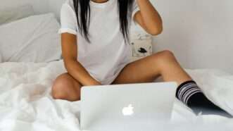 A woman using a laptop in a bed | Photo by <a href="https://unsplash.com/@charlesdeluvio?utm_content=creditCopyText&utm_medium=referral&utm_source=unsplash">charlesdeluvio</a> on <a href="https://unsplash.com/photos/woman-wearing-white-crew-neck-t-shirt-on-bed-holding-silver-macbook-vKEwDELlFbg?utm_content=creditCopyText&utm_medium=referral&utm_source=unsplash">Unsplash</a>       