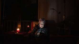 An old man sits in a chair in a dimly lit room | Abaca Press/Europa Press/Abaca/Sipa USA/Newscom