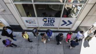 People in a long line, seen from above, waiting to get a REAL ID at an Illinois Department of Motor Vehicles. | TANNEN MAURY/UPI/Newscom