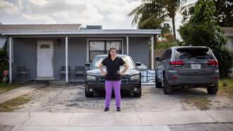Sandy Martinez stands in front of her home | Sandy Martinez (Institute for Justice)