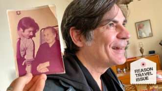 Nick Gillespie photographed alongside a photo of his ancestor | Photo: Sarah Rose Siskind