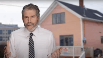 John Stossel is seen in front of "the little pink house," which was at the center of the eminent domain case, Kelo v. New London | Stossel TV