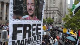 A protest sign that reads Free Mahmoud | Jimin Kim/ZUMAPRESS/Newscom