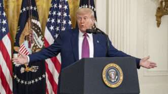 President Donald Trump speaks behind a podium | Ken Cedeno/UPI/Newscom