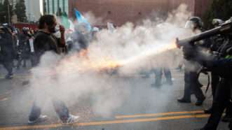 Police and protesters clashing in Los Angeles |  Matthew Hoen/ZUMAPRESS/Newscom