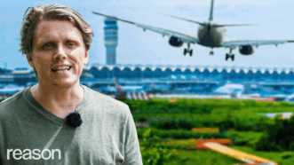 Eric Boehm is seen with an airplane and an air traffic control tower in the background | Adani Samat/Cody Huff