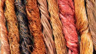 Spools of copper wire sit next to each other | ID 63009145 ©  Mohamed  Ahmed Soliman | Dreamstime.com