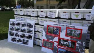Case files from the civil lawsuit against Jeffrey Epstein on display outside the Palm Beach County Court in Florida on Dec. 4, 2018. | Emily Michot/Newscom